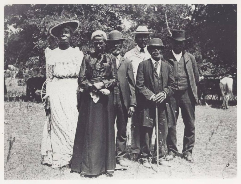 A group of well-dressed older adults on Juneteenth