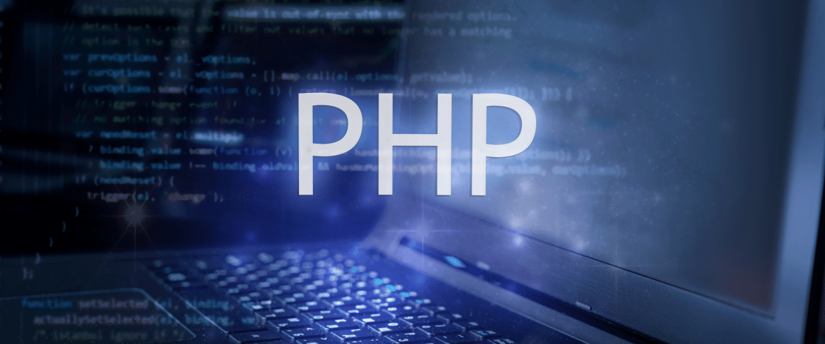 PHP text overlayed on a laptop computer background